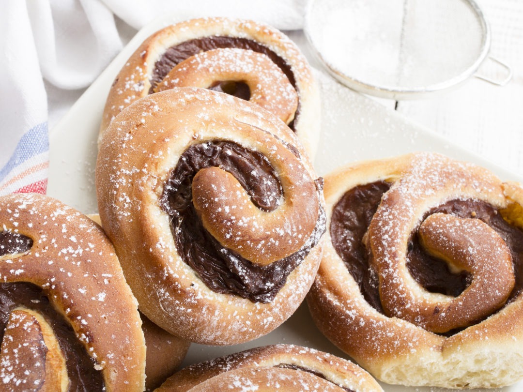 Homemade cream buns with chocolate