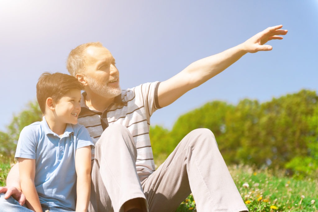 Cheerful grandfather is spending time with grandchild
